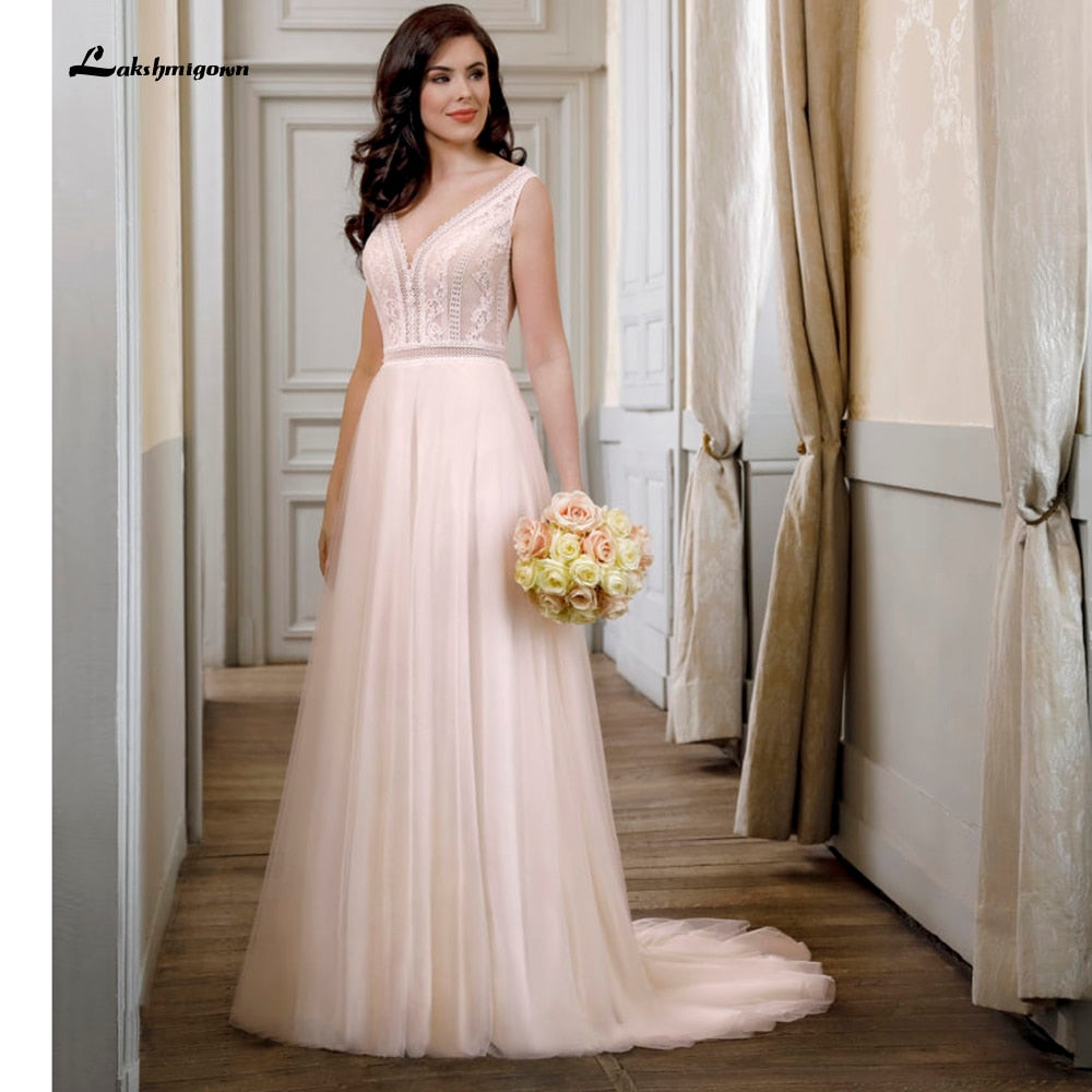 Spaghetti strap blush pink beaded wedding gowns. #bohowedding  #bohoweddingdresses #weddingdresse… | Wedding dresses beaded, Pink wedding  gowns, Beaded wedding gowns